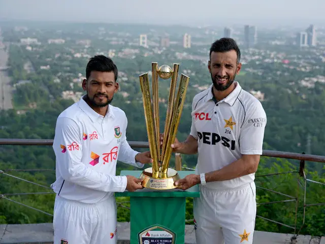 Shan Masood and Nazmul Hossain Shanto with Test series trophy